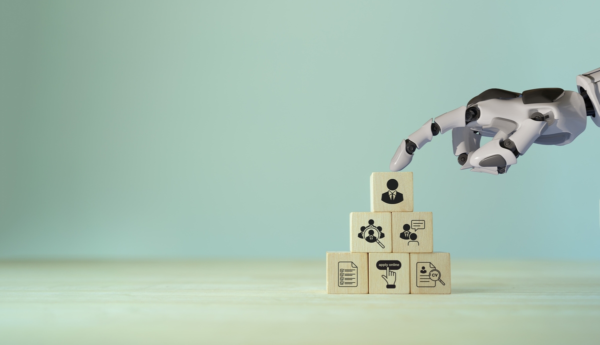 AI recruiting technology concept. Using artificial intelligence in the talent acquisition process. A robot choosing business people to hire. HR technology ecosystem strategies for HR professionals.