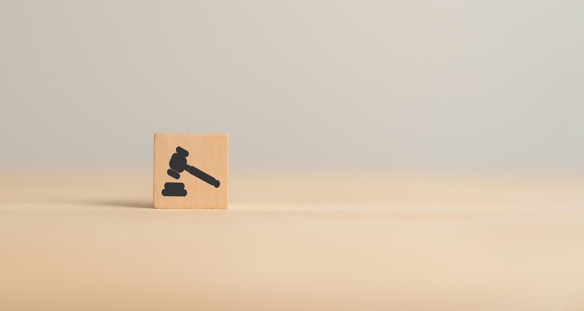 Wooden cube block shape with icon law legal justice. Law business and justice banner. Modern wooden cube blocks design with justice symbol on smart grey background and copy space.
