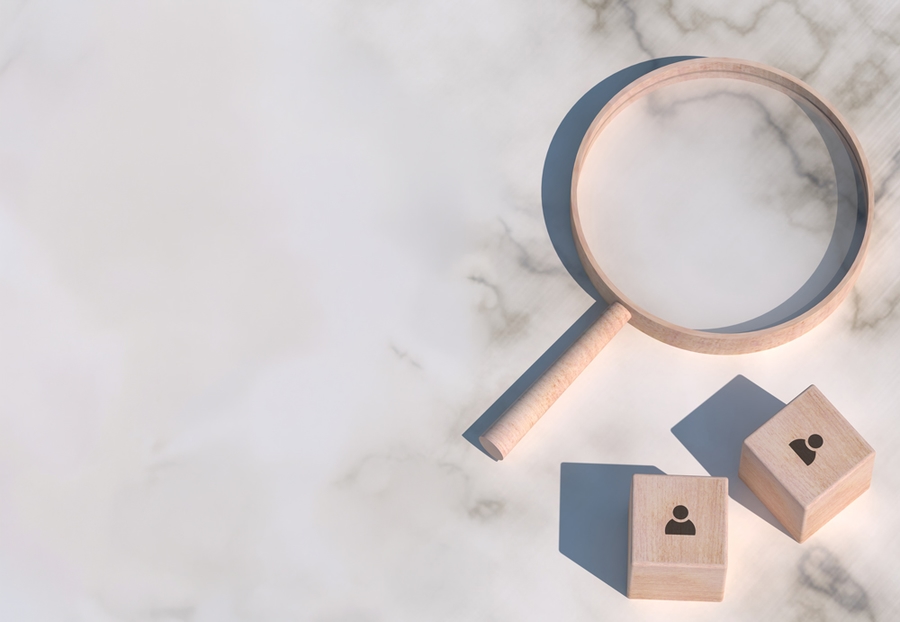 conceptual-business-illustration-with-wooden-blocks-icons-magnifying-glass-marble-background-2